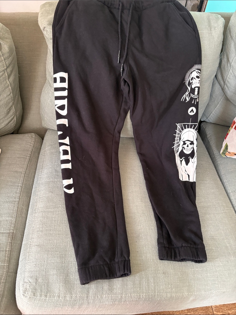 Airwalk Black Jogger Sweatpants with White Skull Graphics
